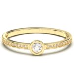 Pavé band with a Bezel Round diamond ring in 18k gold