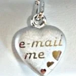 Heart pendant in white gold 750 cambered, partly sanded