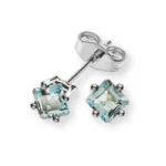Boucles d'oreilles or blanc 750 avec 2 carrés topaze bleue 4 anses