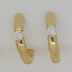 Solitärkreolen Klemmfassung Gelbgold 750 0.16ct.