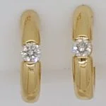 Solitaire creoles clamping setting yellow gold 750 0.20ct.