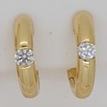 Solitaire creoles clamping setting yellow gold 750 0.25ct.