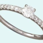 Bague en or blanc 750 avec 1 brillant H SI 0.27ct & 16 brillants H SI 0.22ct.