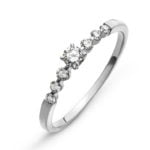 Bague en or blanc 750 avec 6 diamants H SI Tot. 0.13ct. & 1 brillant H SI 0.14 ct.