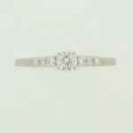 Bague en or blanc 750 avec 6 diamants H SI Tot. 0.12ct. & 1 brillant H SI 0.23 ct.