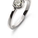 Solitaire serti clos or gris 750 H SI 0.33ct.